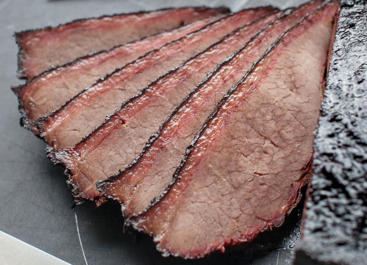 A smoke ring seen on slices of brisket