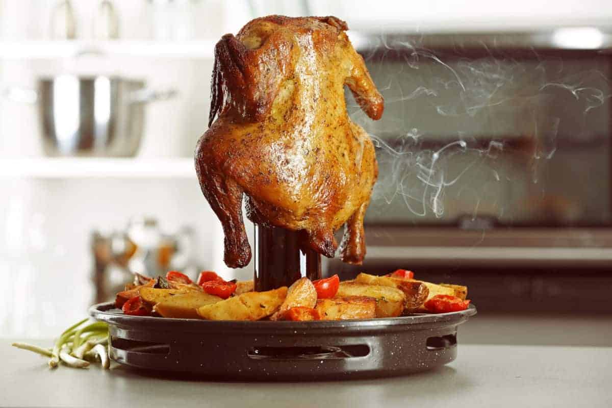 An alternative to beer can chicken: A vertical chicken hol.