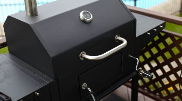 A brand-new smoker on decking, ready to be seasoned.