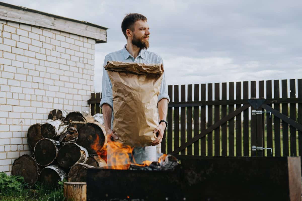 man with bag of charc.