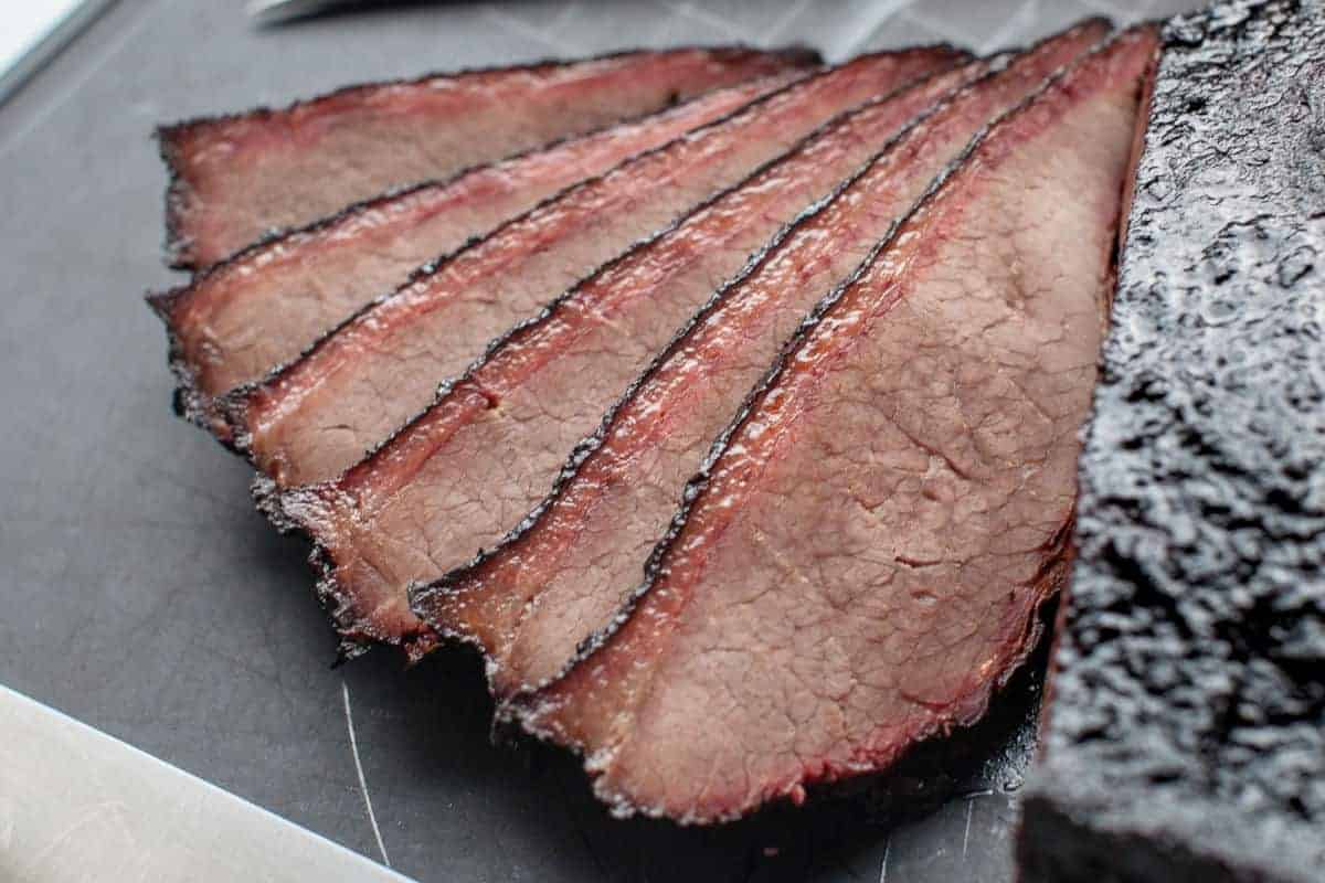 A smoke ring seen on slices of brisket