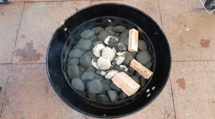 Overhead view of Minion method used in a weber smoky mountain.