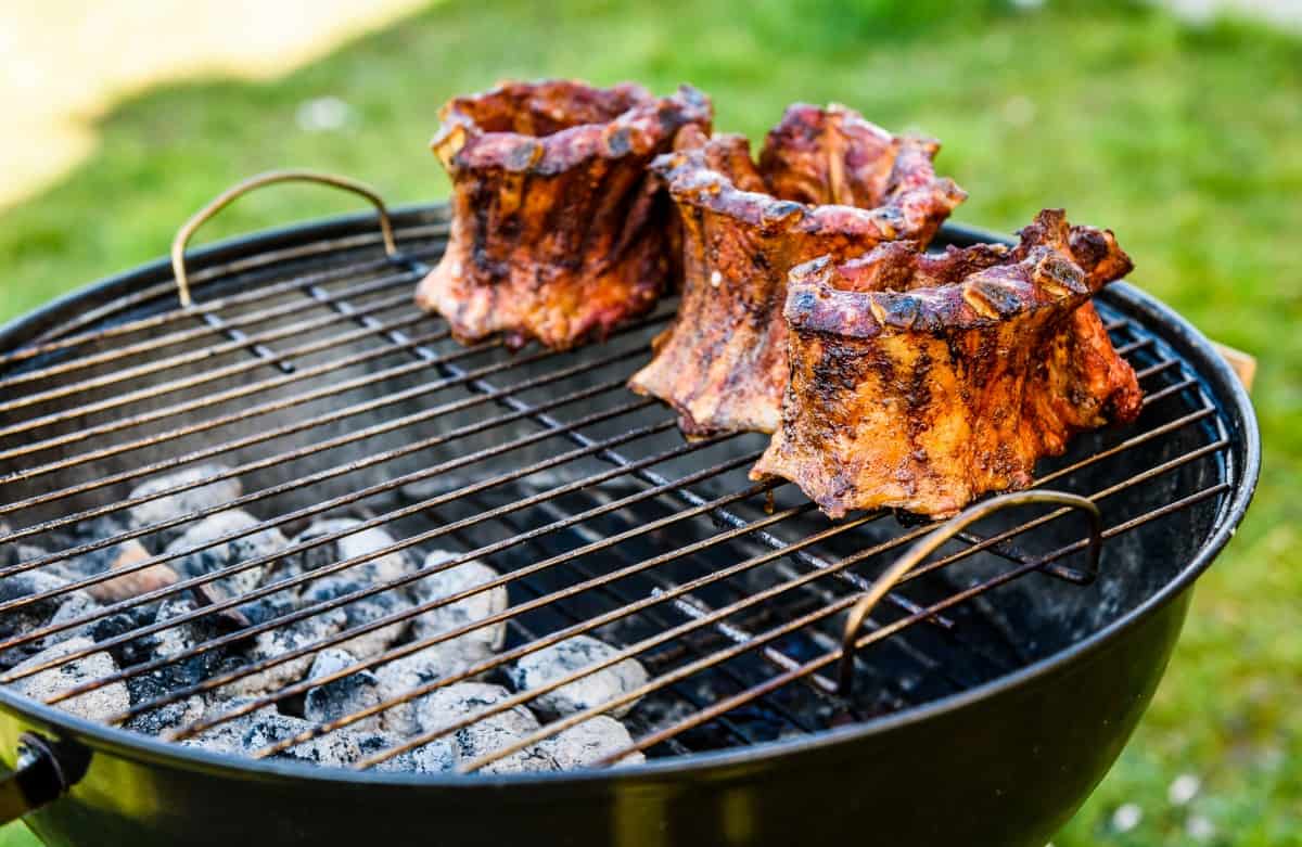 rib crowns cooking indirect on a charcoal gr.