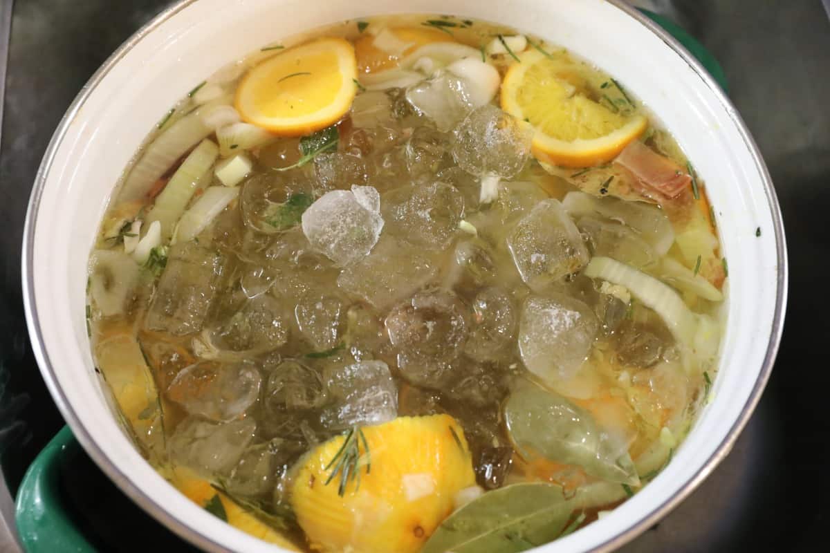 Ice added to wet brining ingredients to cool it rapidly, ready for u.