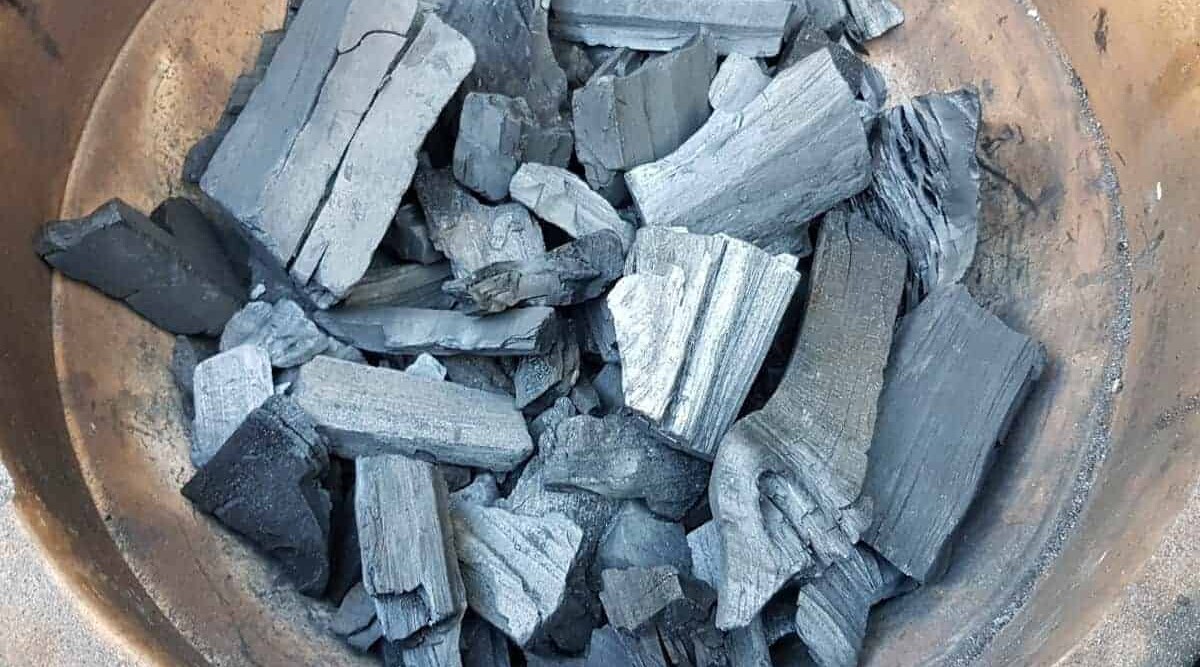 A close of lumpwood charcoal chunks.