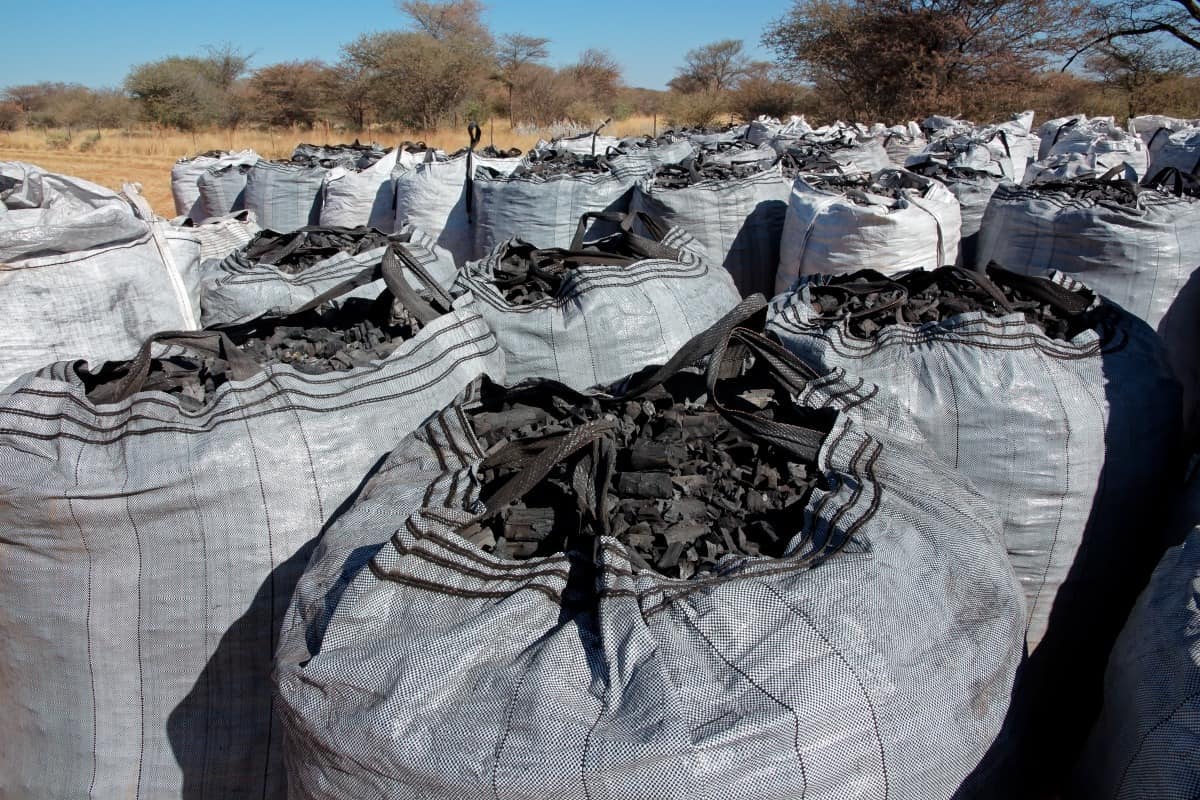 large white builders bags of charcoal in stor.