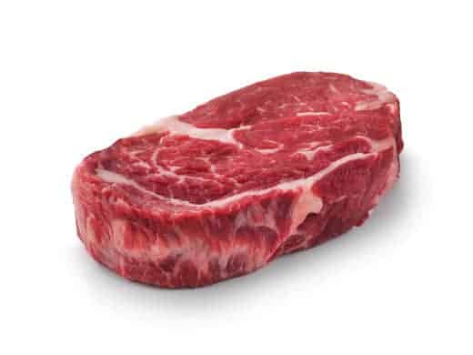 Raw chuck eye steak isolated on wh.