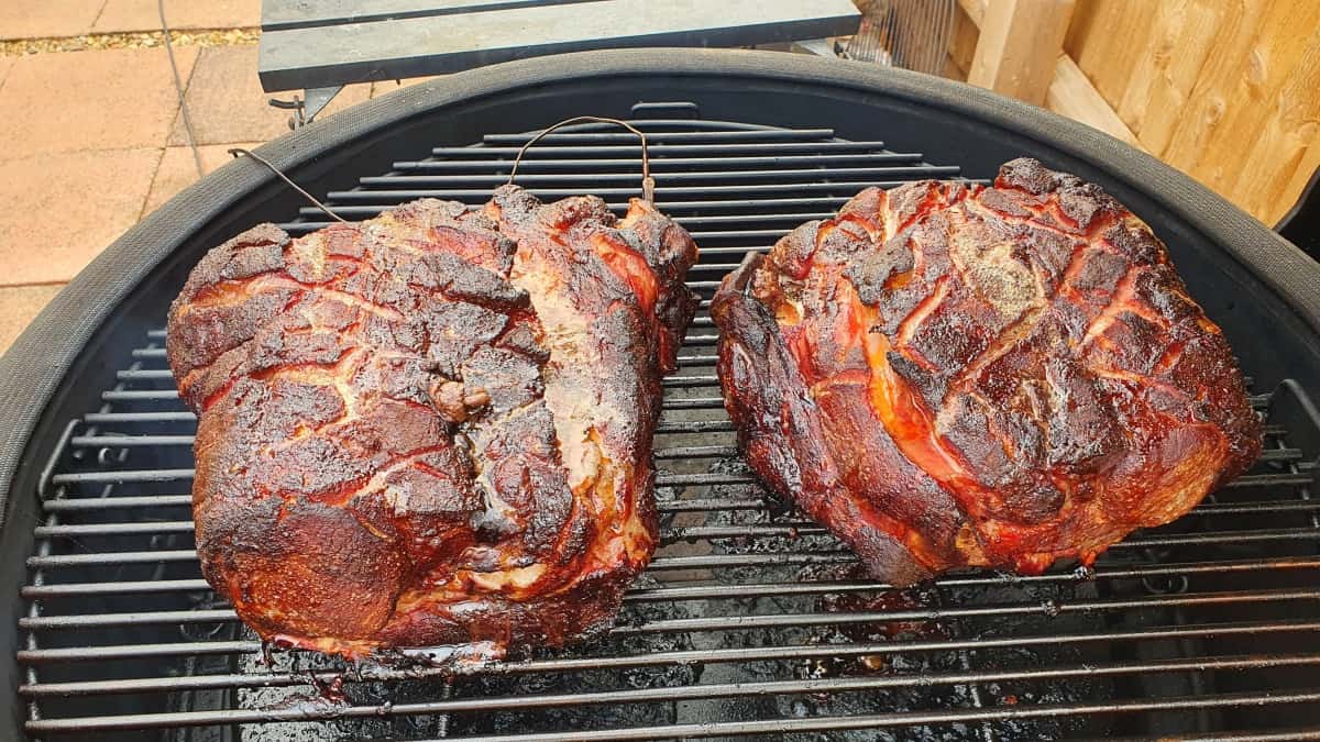 Two pork butts smoked in a kamado smo.