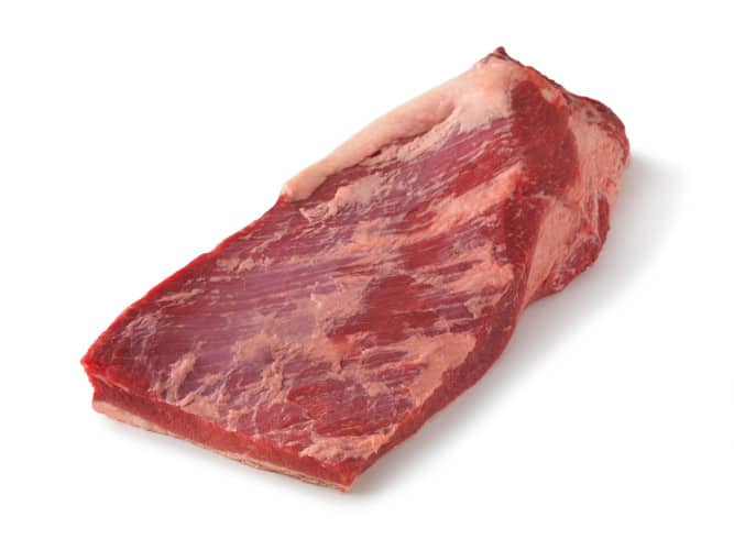 A whole packer brisket isolated on white