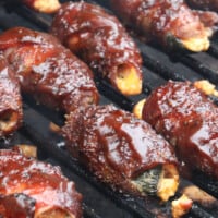 Close up of sauced atomic buffalo turds on the grill