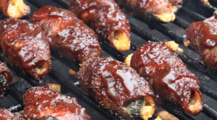 Close up of sauced atomic buffalo turds on the grill.