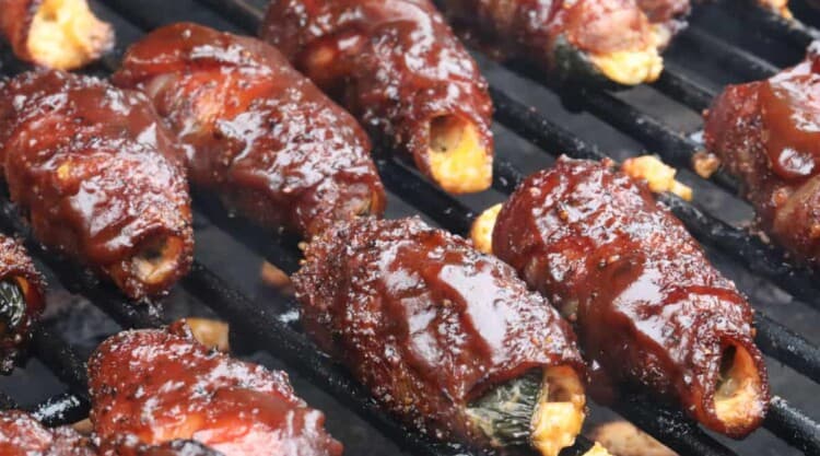 Close up of sauced atomic buffalo turds on the grill.