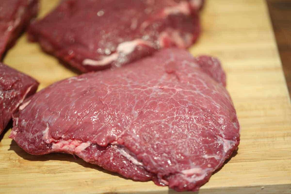 raw, trimmed beef ch.