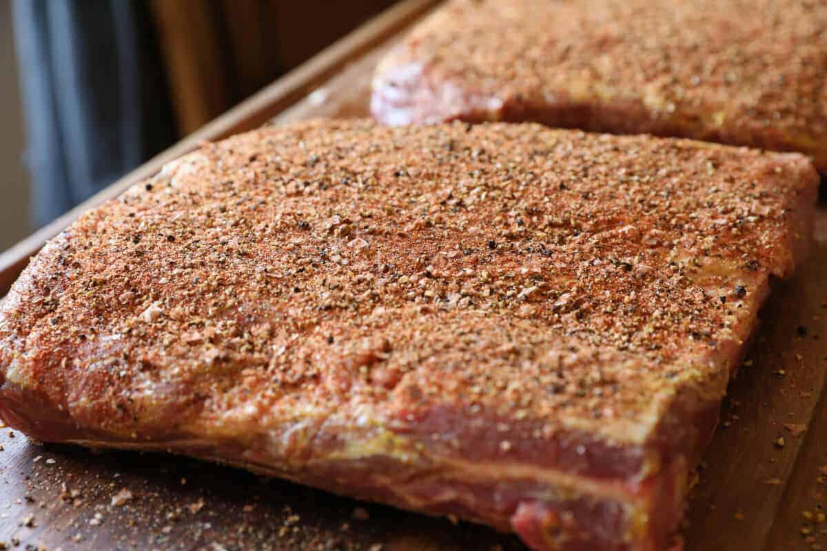 Rack of beef ribs with a dry rub applied