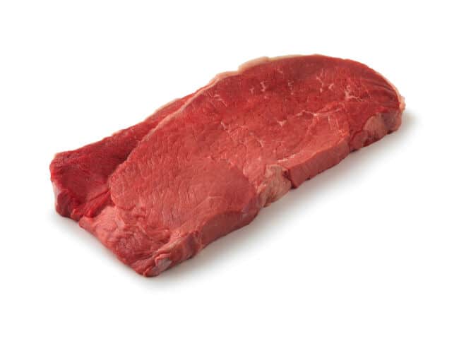 Top Round Steak isolated on wh.