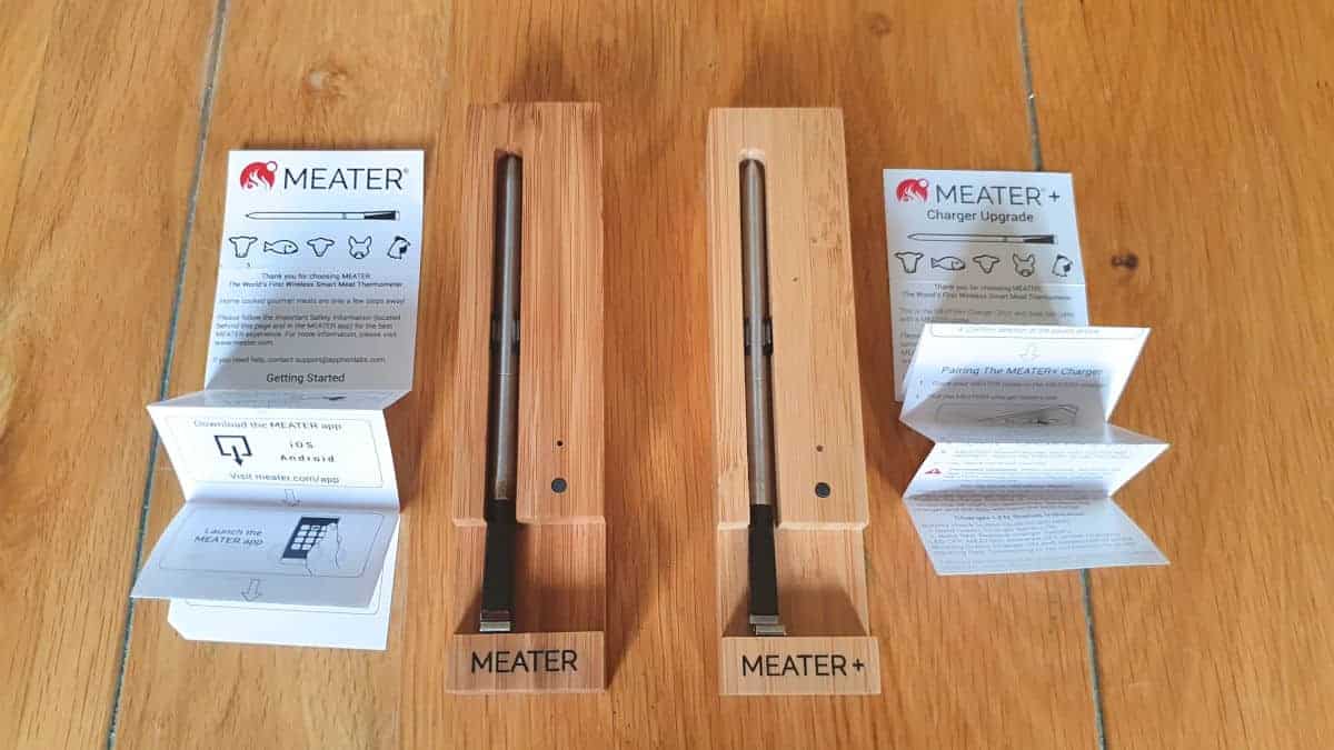 meater and meater+ with packaging and manuals on a wooden table