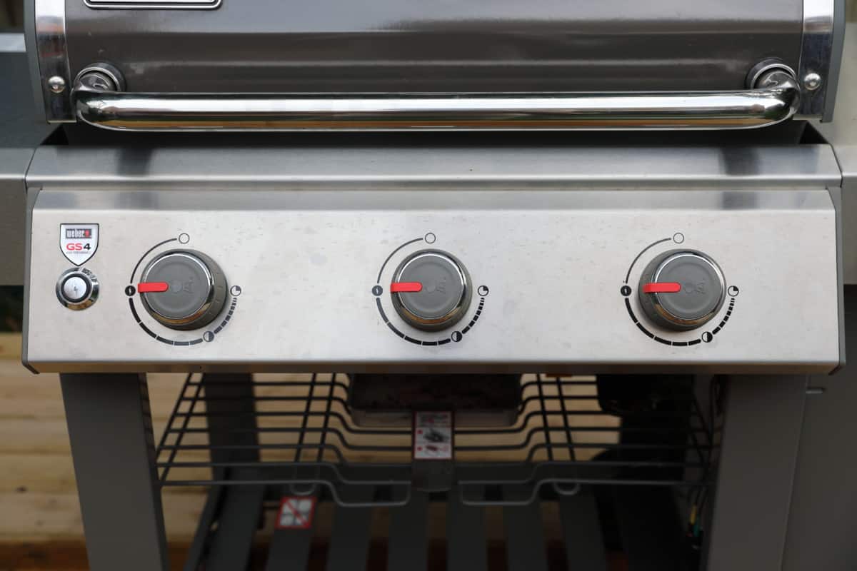 Close up of the weber genesis II E-310 gas knobs.