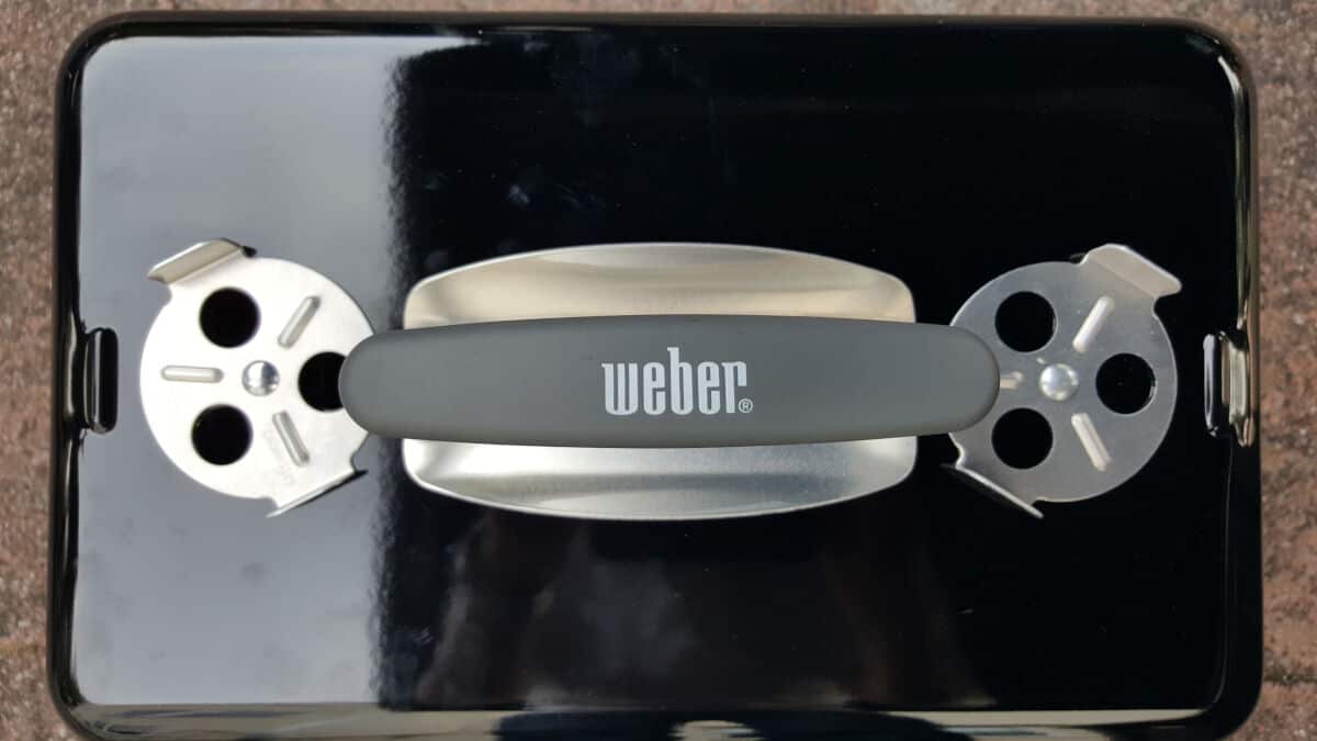 Close up of weber go anywhere lid showing the two ve.