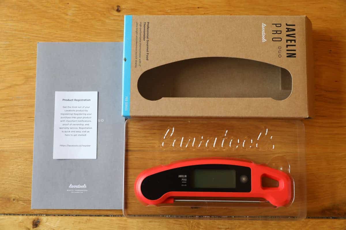 Contents of lavatools javelin pro duo thermometer laid out on a wooden table.