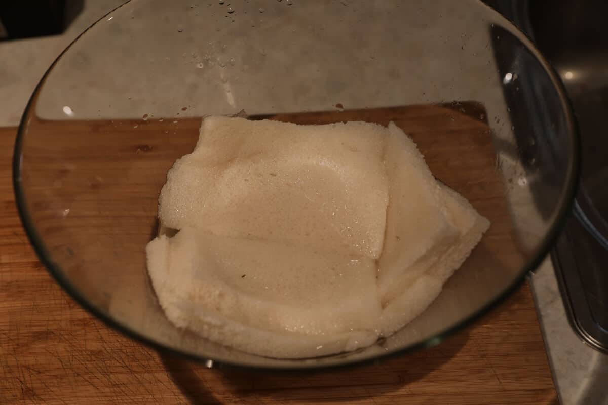 A few slices of bread soaking in wa.