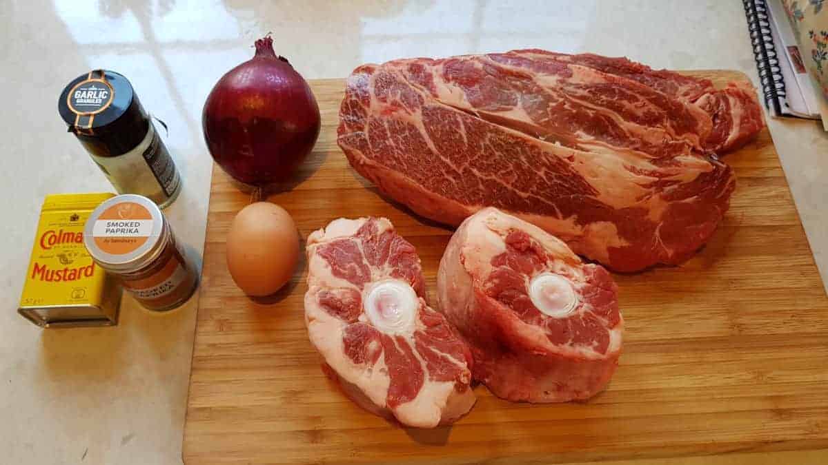 Burger ingredients, including oxtail, chuck, mustard, onion and egg