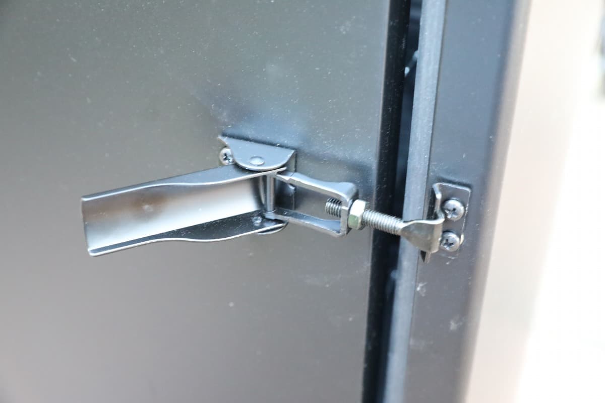 Close up of Masterbuilt 30 electric smoker door latch
