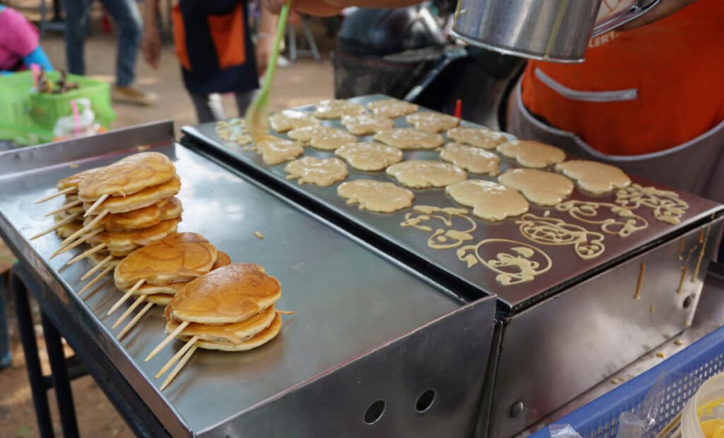 pancakes cooking on a dedicated griddle