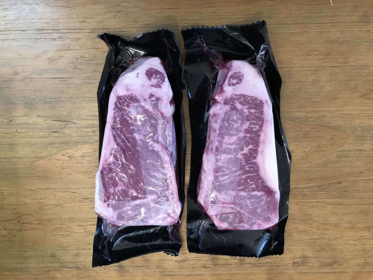 Two steaks from Porter Road in their packag.