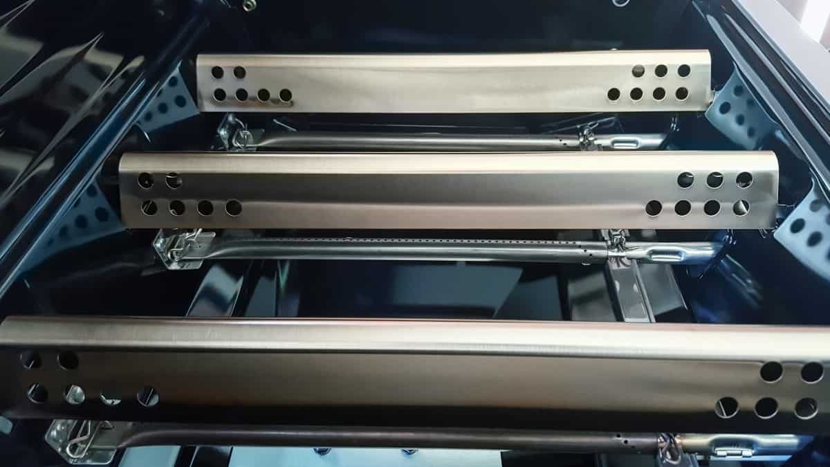 A look at a gas grills flavorizer bars, with the grates remo.