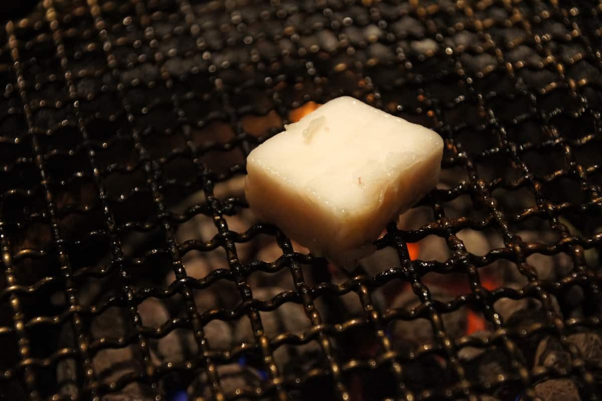 Tallow coating the net of a yakiniku restaur.