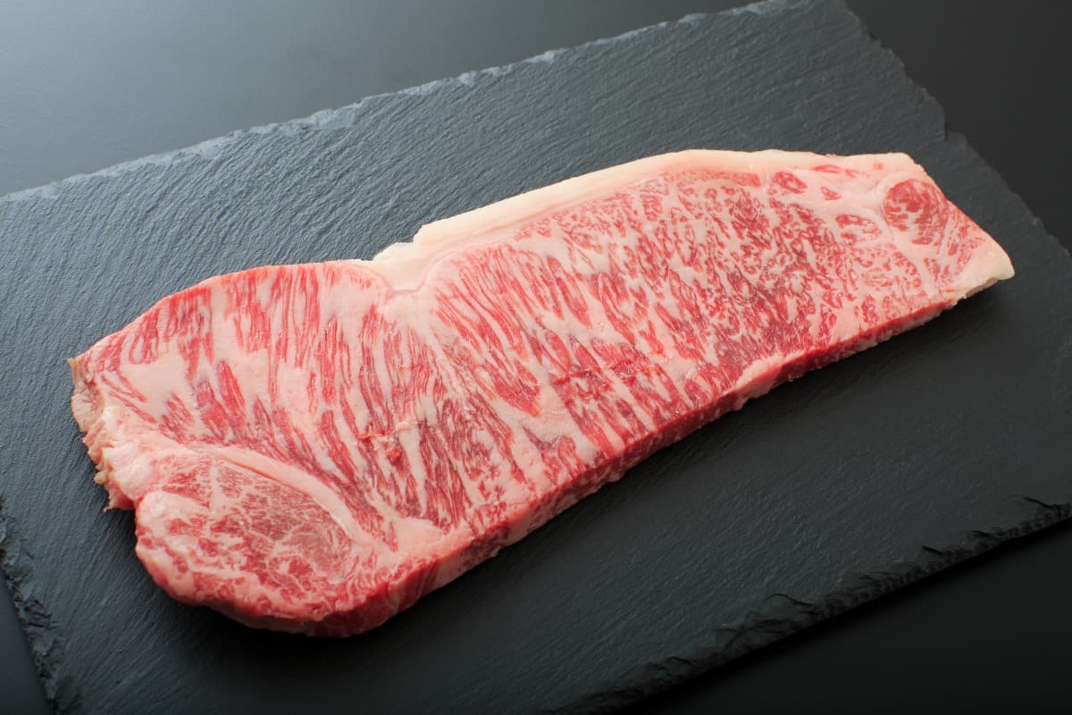 japanese A5 wagyu steak selection on a cutting board