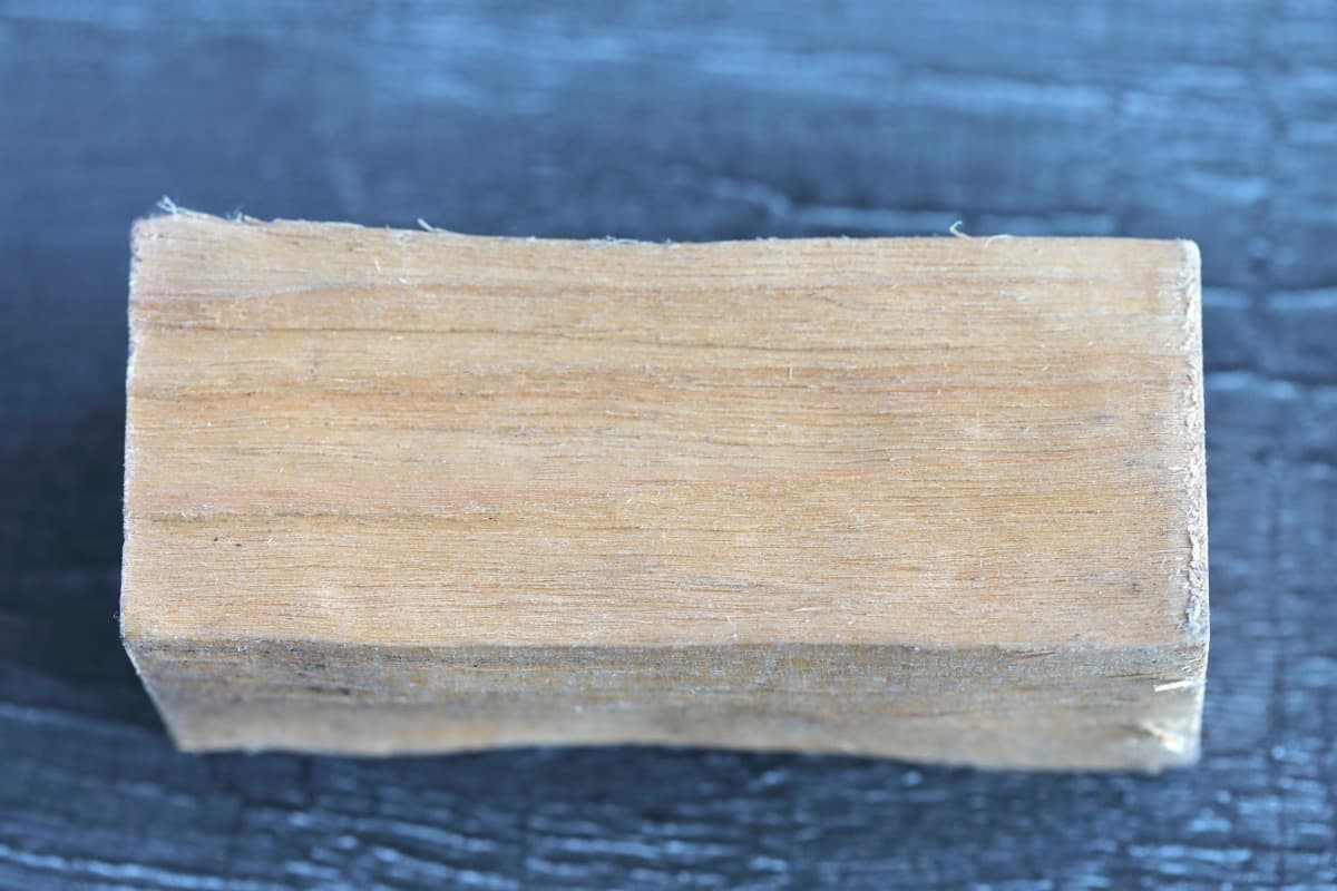 Close up of a single piece of alder wood, showing it's grain