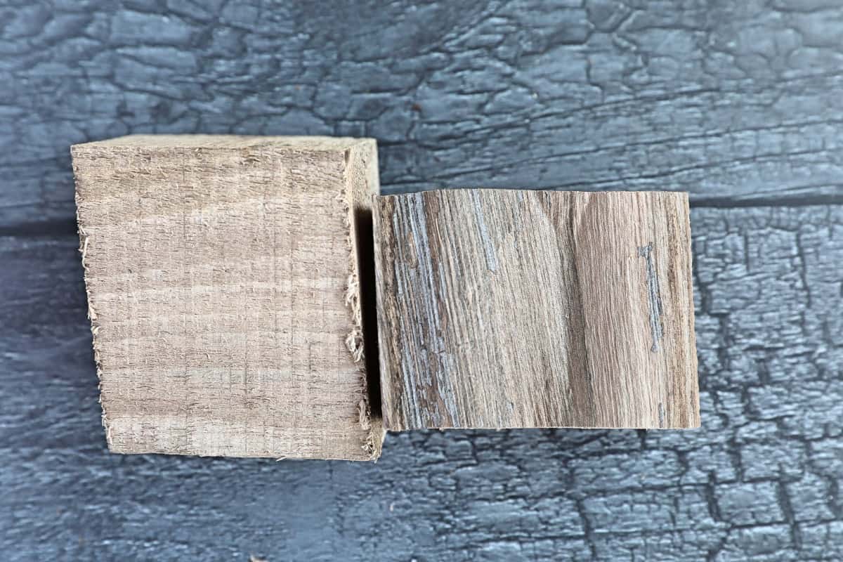Two chunks of walnut smoking wood, arranged to show us the grain of the wood in detail.