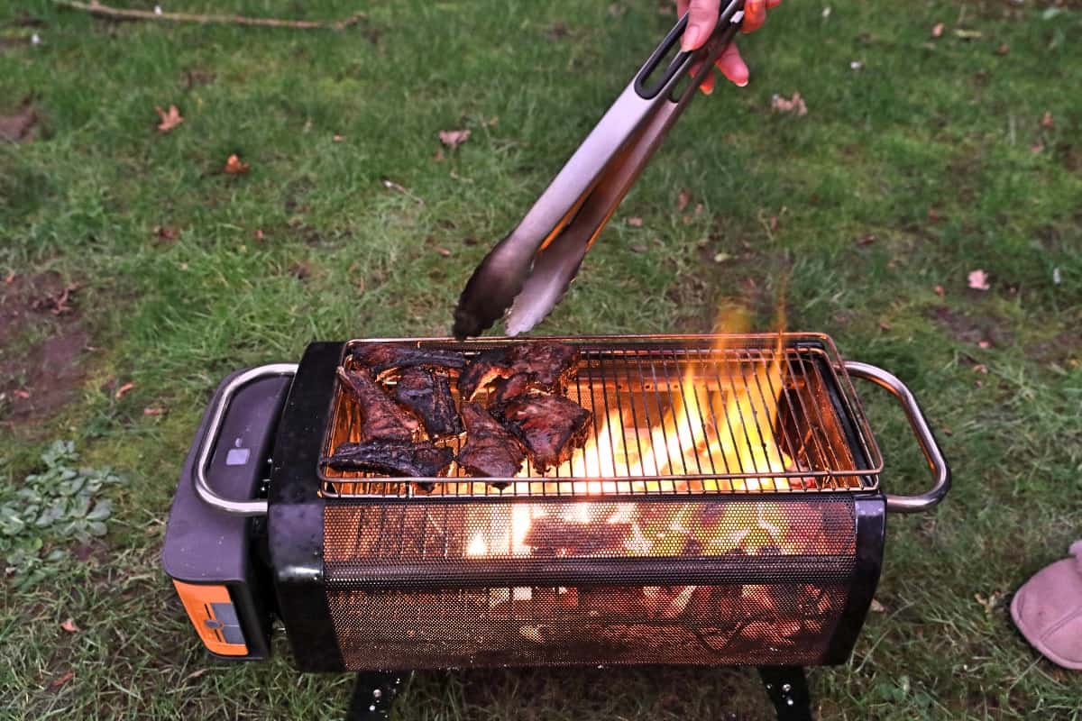 Grilling lamb cutlets on the BioLite FirePit+.