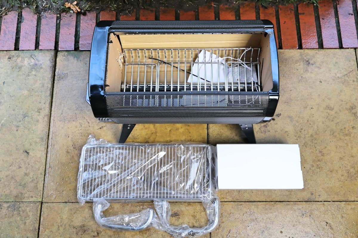 The BioLite Firepit+ box contents laid out on the floor.