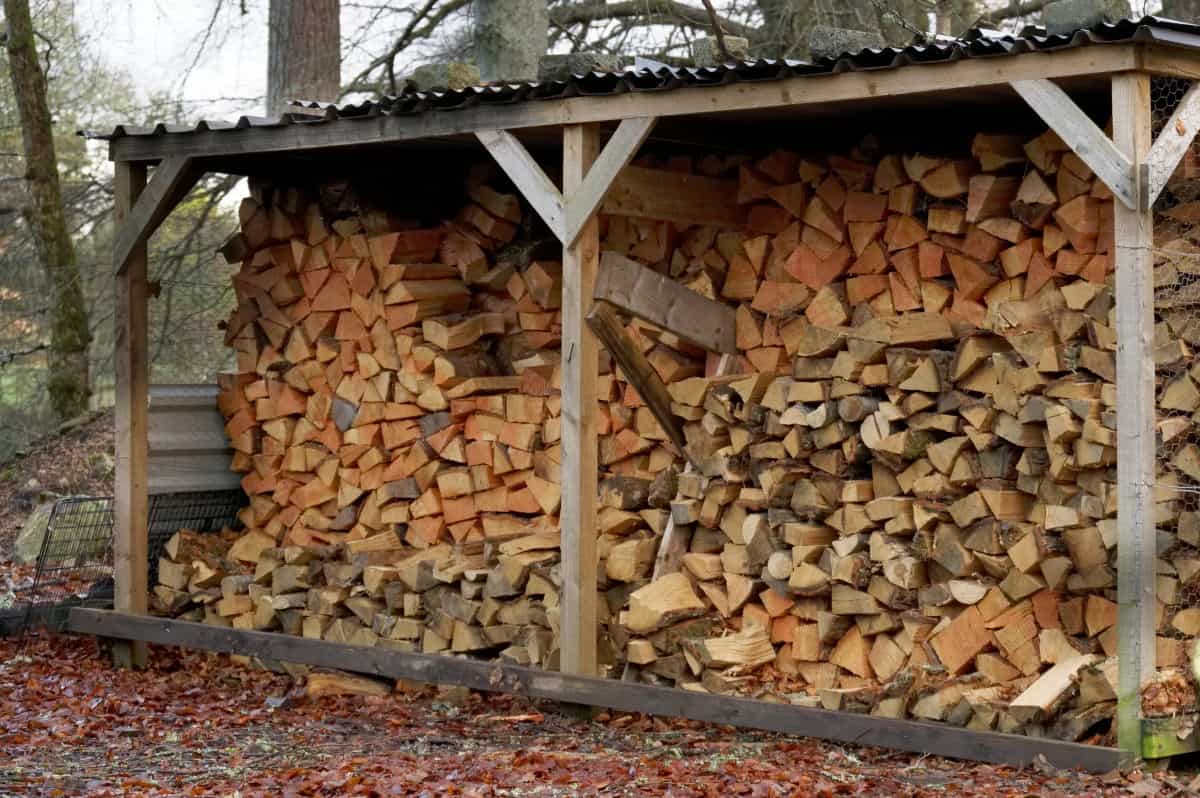 A log store full of wood, being seasoned / dried out for burning.