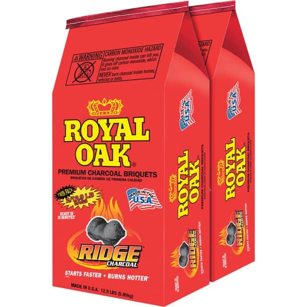 Two packs of royal oak premium charcoal briquettes isolated on white.