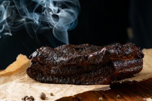 Ultimate Guide to Smoking Wood: Types, Flavors, & Meat Pairings