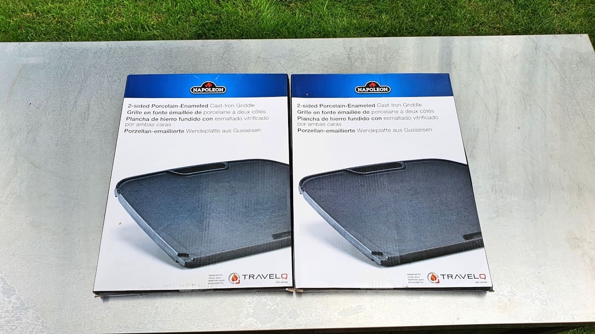 Two solid cast-iron griddle grates still in boxes, for the Napoleon Pro 285.