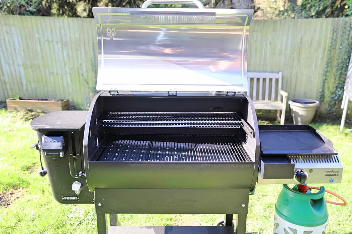 Close up of Camp Chef Woodwind WiFi 36, with lid open, showing internal grates