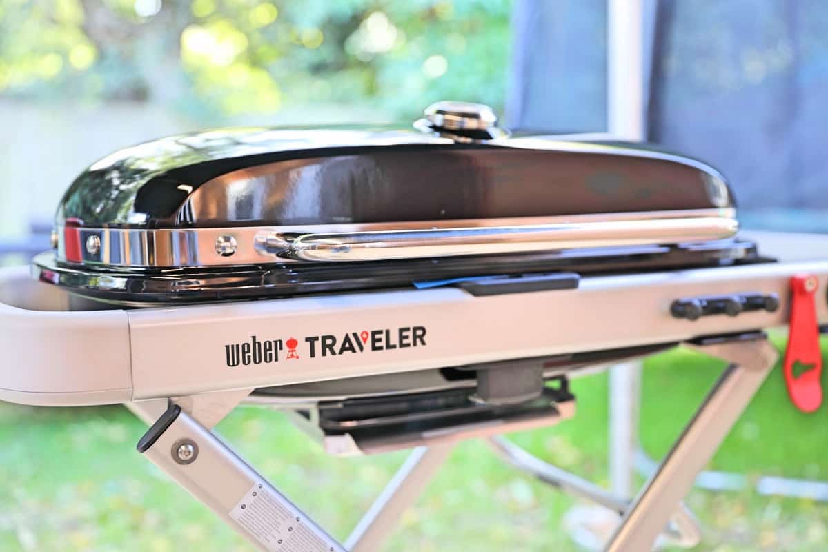 Angled view of Weber Traveler grill with lid closed