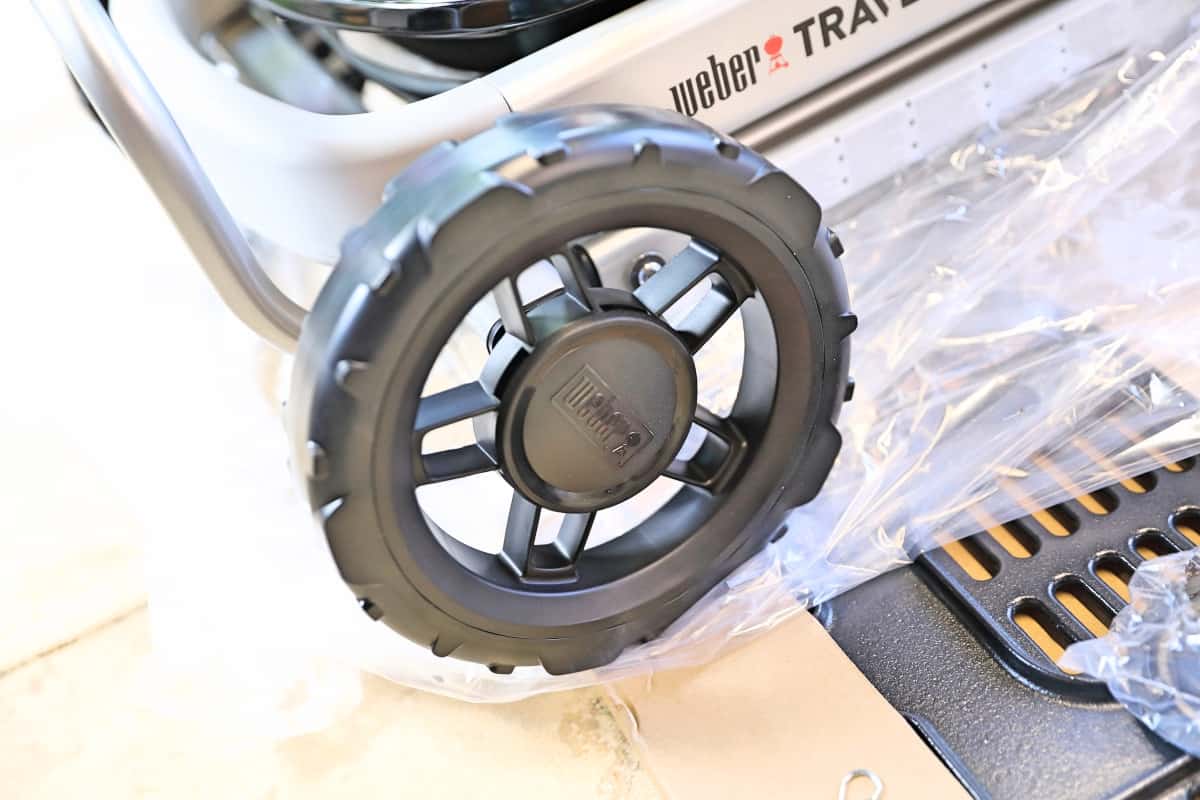 Close up of Weber Traveler plastic wheel