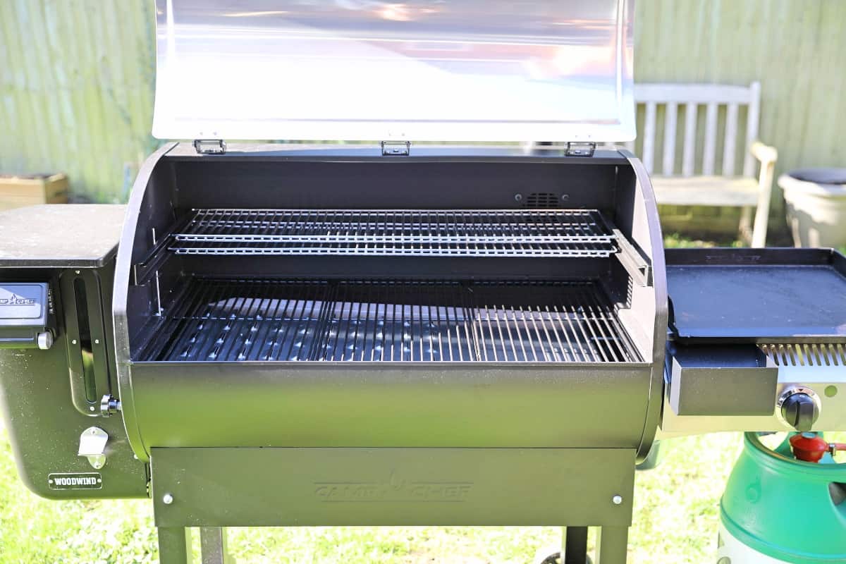 Close up of Camp Chef Woodwind Wi-Fi 36 cooking chamber with the lid o.