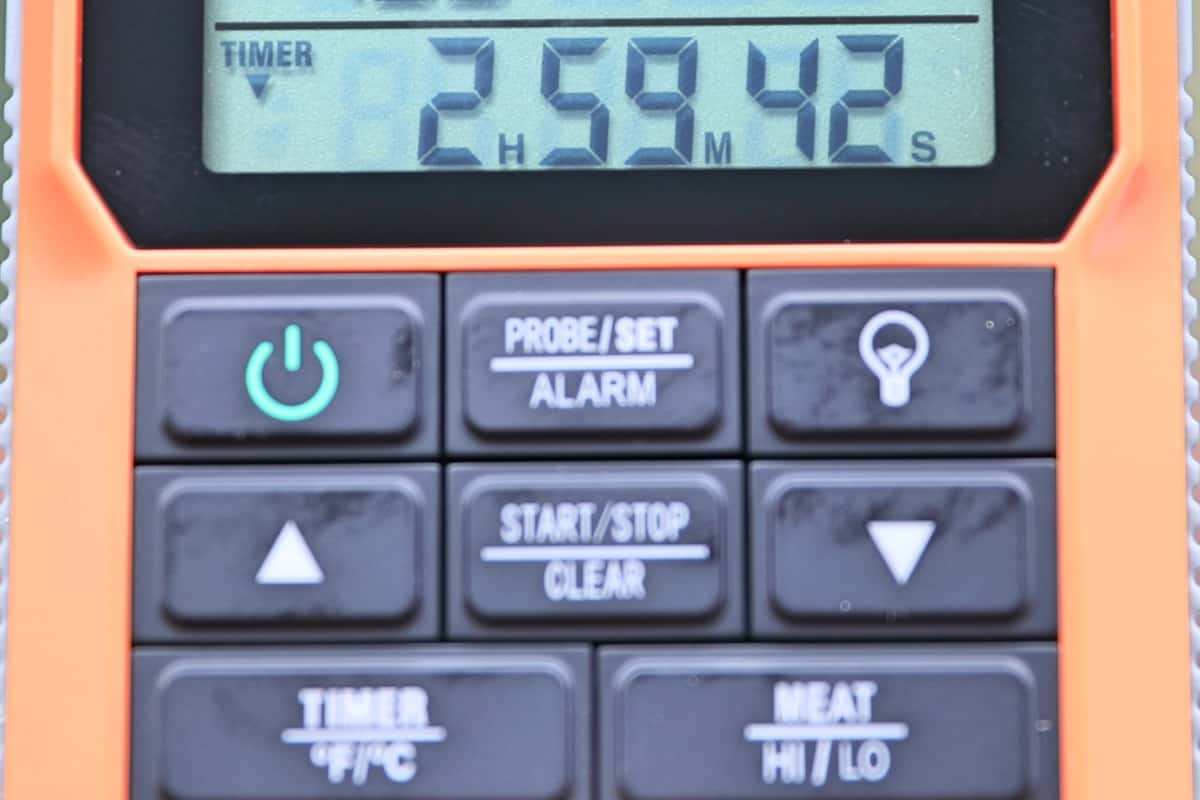 Close up of the ThermoPro TP826 showign the timer counting down, and the top few buttons on the receiver