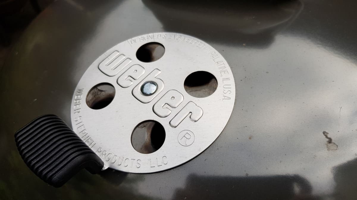 Close up of the Weber Master Touch Upper Lid Vent