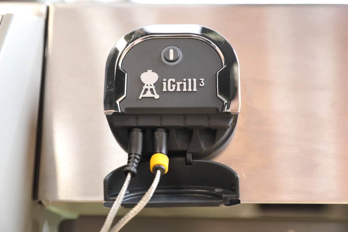 Close up of Weber iGrill 3 in use, attached to a Genesis gas grill side table
