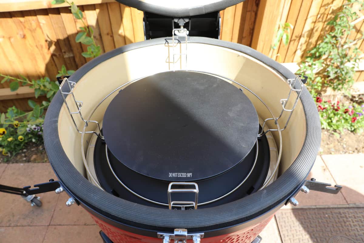 The SloRoller and divide and conquer rack system inserted into a Kamado Joe Big Joe III.
