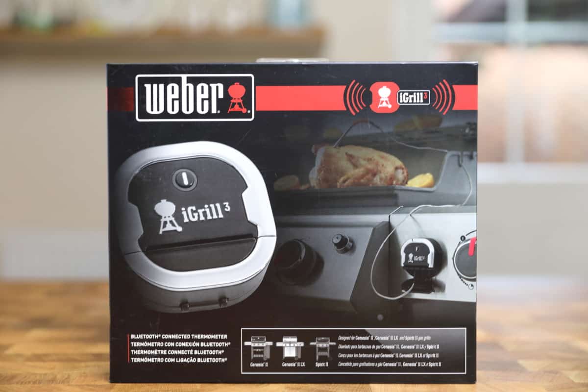 Weber iGrill 3 box on a wood table.