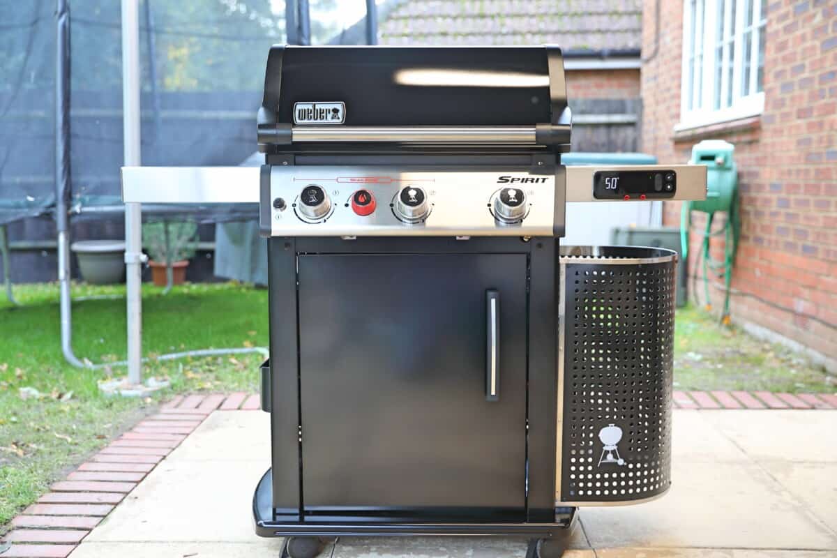 Weber Spirit EPX-325S on a patio, photographed from the front.