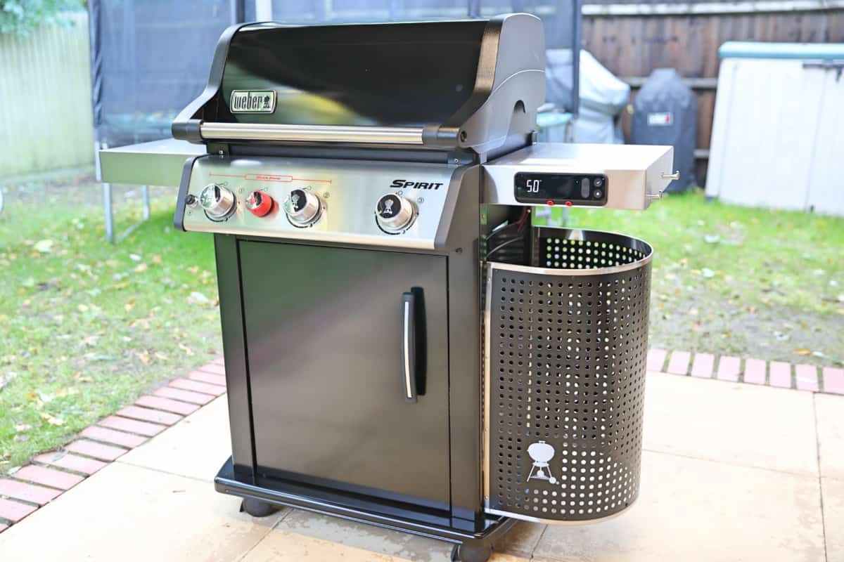 Weber Spirit EPX-325S on a paved patio, shot from an angled v.